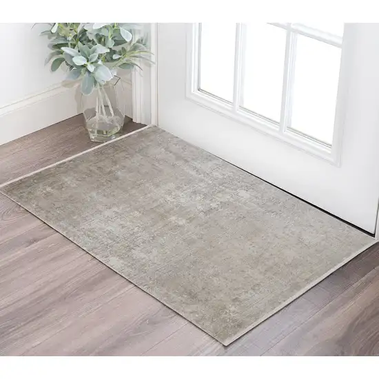 Tan and Ivory Abstract Power Loom Distressed Area Rug With Fringe Photo 1
