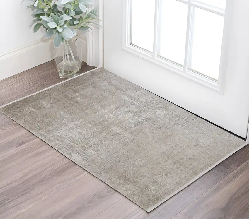 Tan and Ivory Abstract Power Loom Distressed Area Rug With Fringe Photo 1