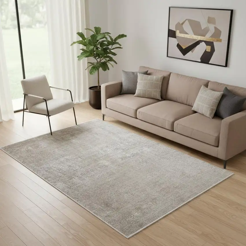 Tan Ivory And Gray Abstract Power Loom Distressed Area Rug With Fringe Photo 1