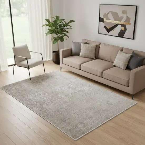 Tan Ivory And Gray Abstract Power Loom Distressed Area Rug With Fringe Photo 1