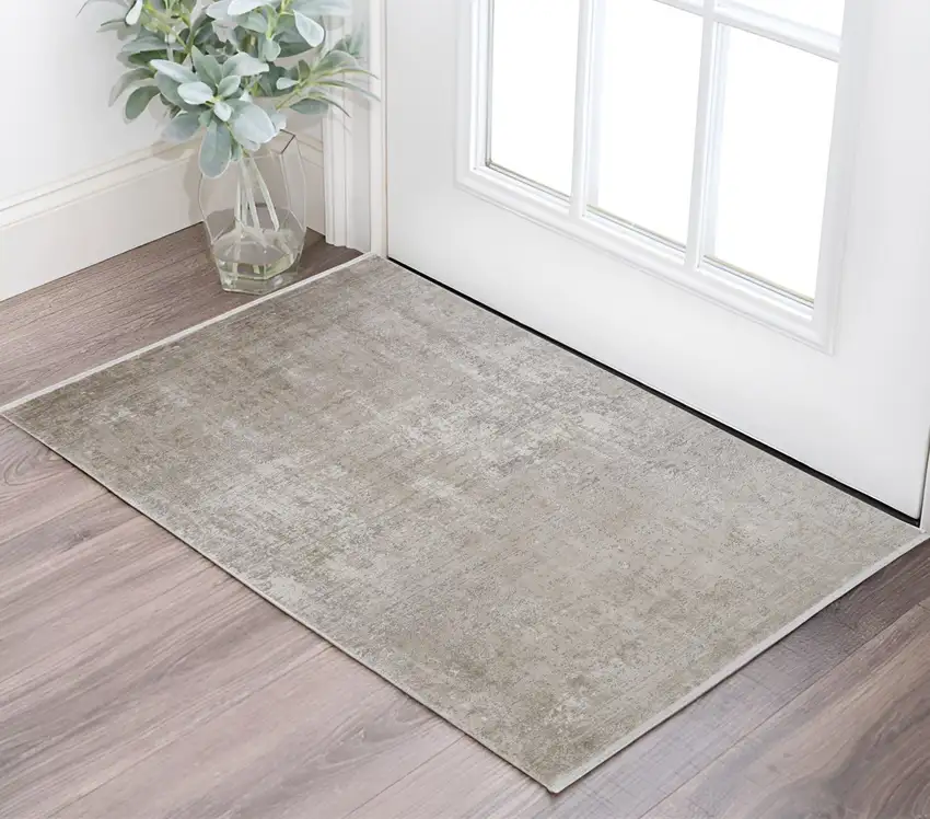 Tan and Ivory Abstract Power Loom Distressed Area Rug With Fringe Photo 1