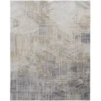 Photo of Tan Ivory And Gray Abstract Power Loom Distressed Area Rug