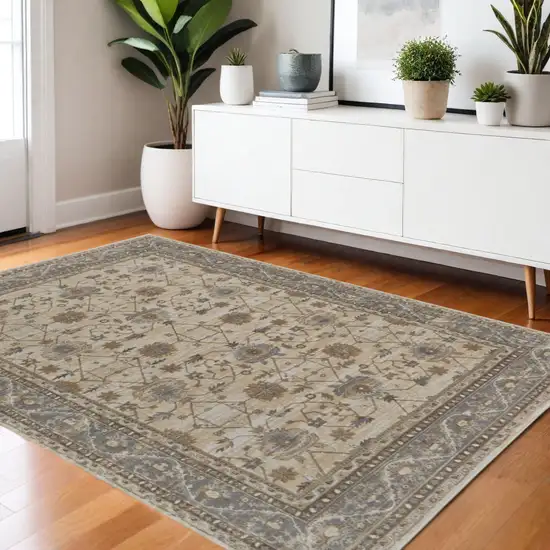 Tan Ivory And Gray Oriental Area Rug Photo 1
