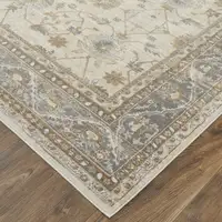 Photo of Tan Ivory And Gray Power Loom Area Rug