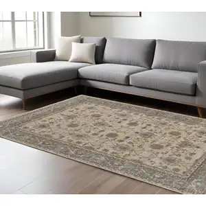 Photo of Tan Ivory And Gray Power Loom Area Rug