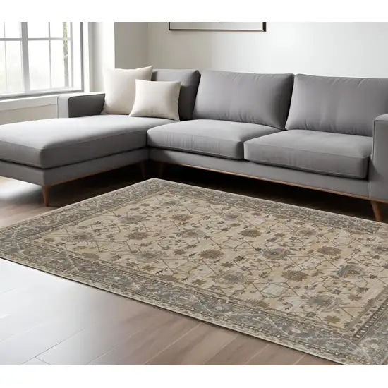 Tan Ivory And Gray Power Loom Area Rug Photo 1