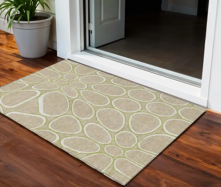 Tan Ivory And Green Abstract Washable Indoor Outdoor Area Rug Photo 1