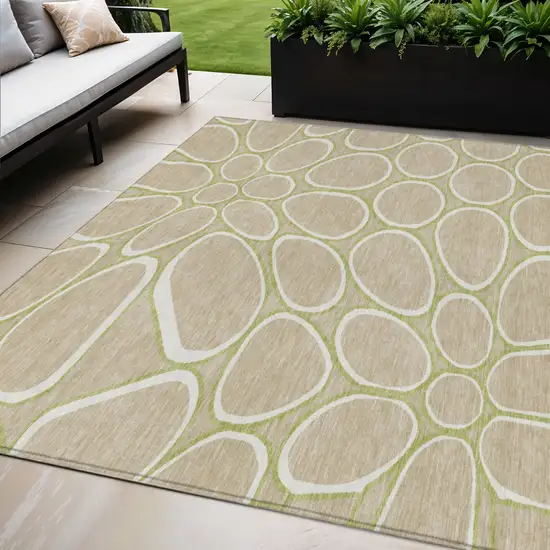 Tan Ivory And Green Abstract Washable Indoor Outdoor Area Rug Photo 1