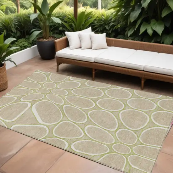 Tan Ivory And Green Abstract Washable Indoor Outdoor Area Rug Photo 1
