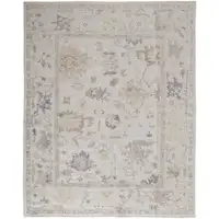Photo of Tan Ivory And Orange Floral Hand Knotted Stain Resistant Area Rug