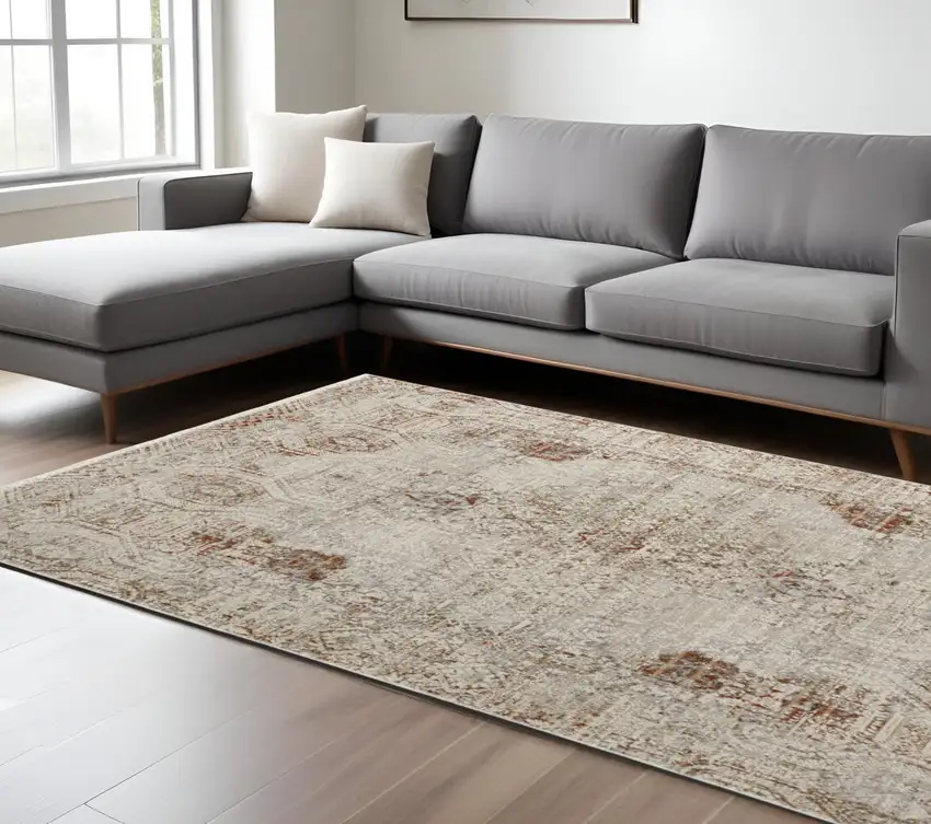 Tan and Ivory Floral Power Loom Distressed Non Skid Area Rug With Fringe Photo 1