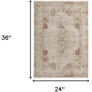 Photo of Tan Ivory And Orange Floral Power Loom Distressed Area Rug With Fringe