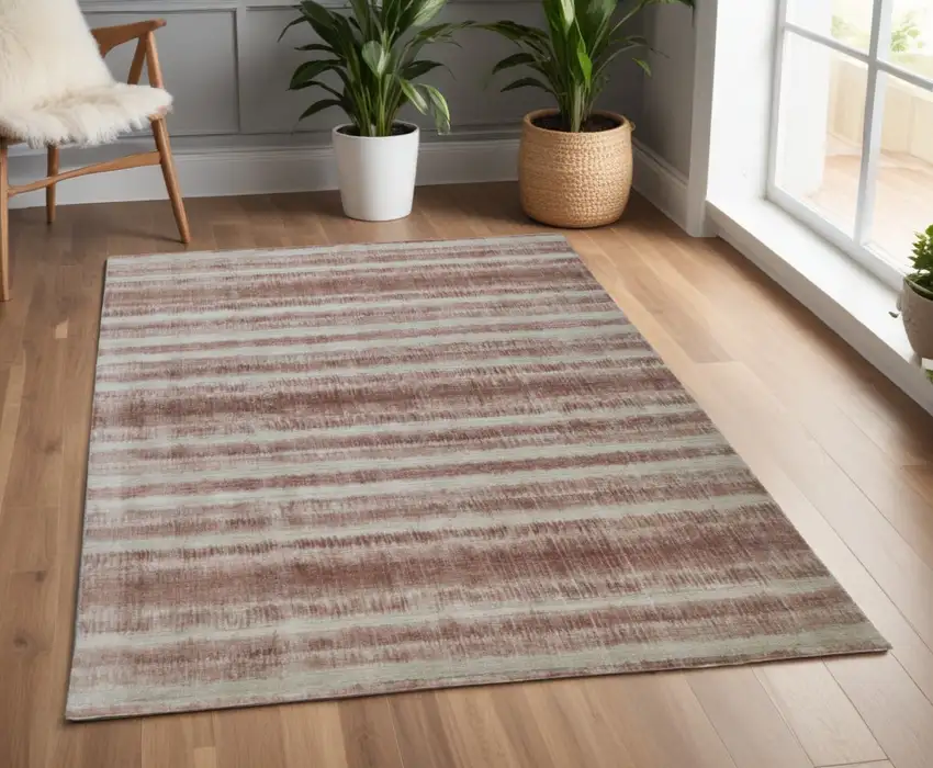 Tan and Ivory Abstract Hand Woven Area Rug Photo 1