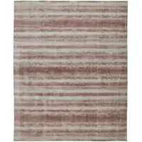 Photo of Tan Ivory And Pink Abstract Hand Woven Area Rug