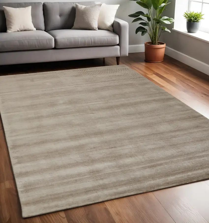 Tan Ivory And Taupe Hand Woven Area Rug Photo 1