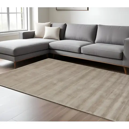 Tan Ivory And Taupe Hand Woven Area Rug Photo 1