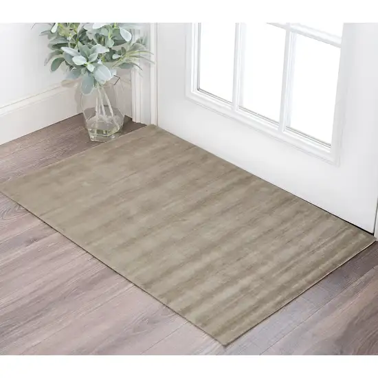 Tan Ivory And Taupe Hand Woven Area Rug Photo 1