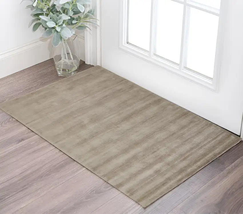 Tan Ivory And Taupe Hand Woven Area Rug Photo 1
