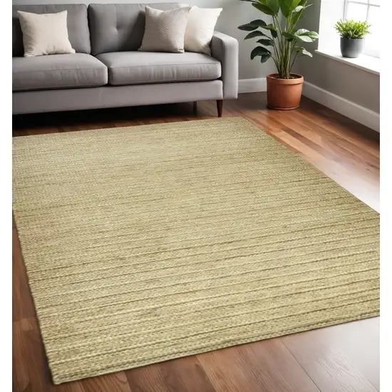 Tan Ivory And Taupe Hand Woven Area Rug Photo 1