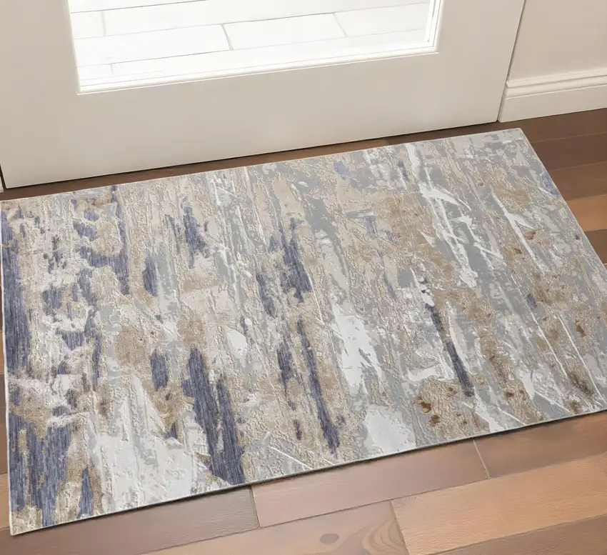 Tan Ivory And Blue Abstract Distressed Area Rug Photo 1
