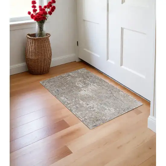 Tan Ivory and Blue Geometric Power Loom Worn Faded Area Rug Photo 1