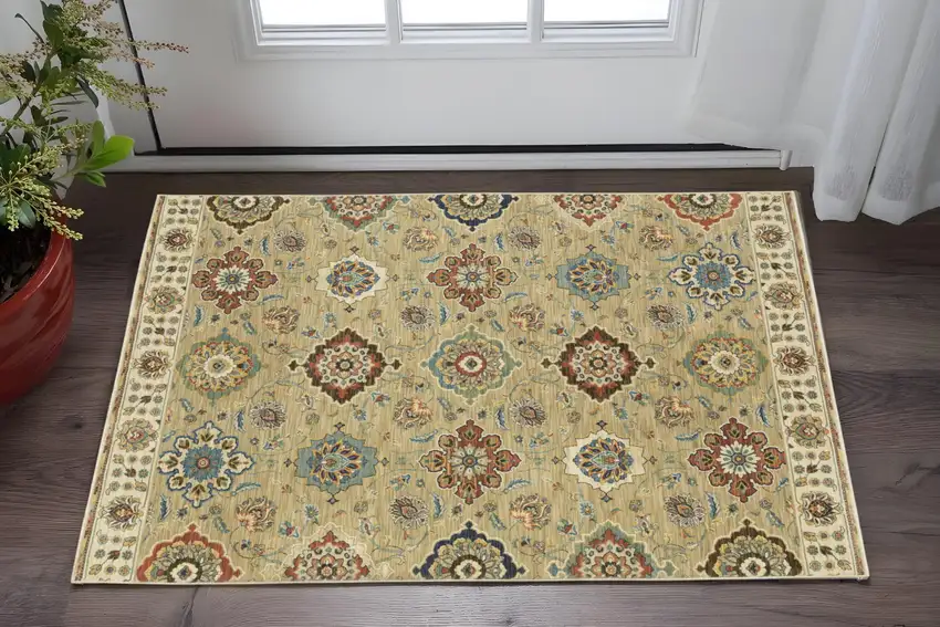 Tan Light Blue And Orange Floral Area Rug With Fringe Photo 1
