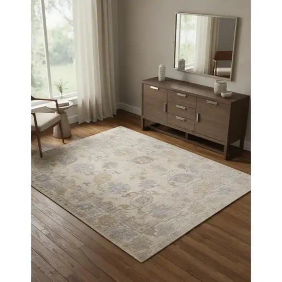 Tan Orange And Blue Floral Hand Knotted Stain Resistant Area Rug Photo 1
