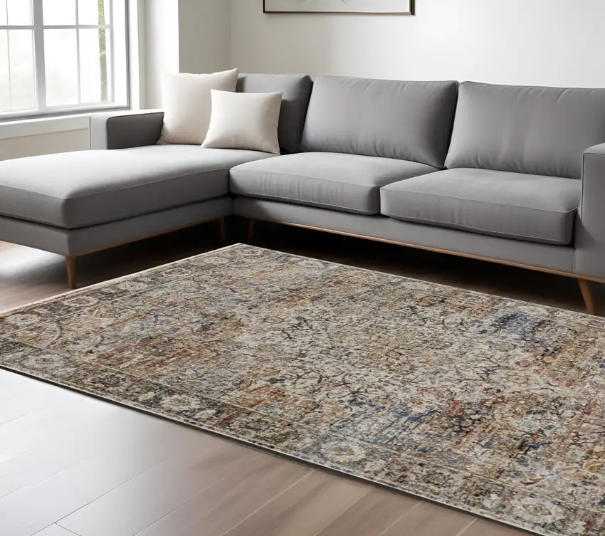 Tan and Blue Floral Power Loom Distressed Non Skid Area Rug With Fringe Photo 1