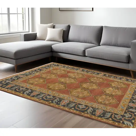 Tan Orange And Brown Wool Floral Hand Knotted Stain Resistant Area Rug Photo 1