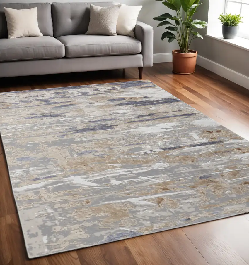 Tan Ivory And Blue Abstract Distressed Area Rug Photo 1