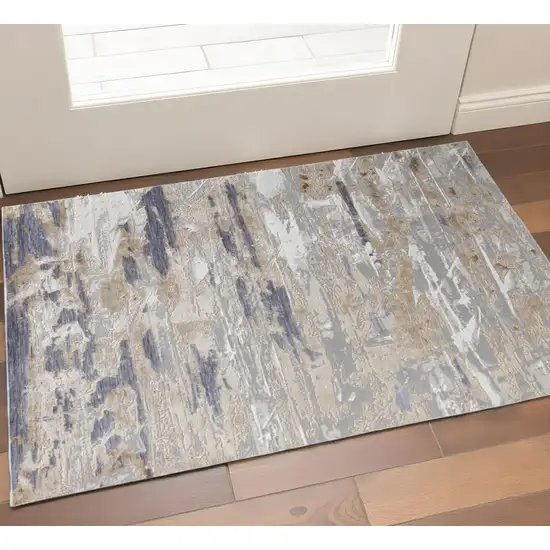 Tan Ivory And Blue Abstract Distressed Area Rug Photo 1