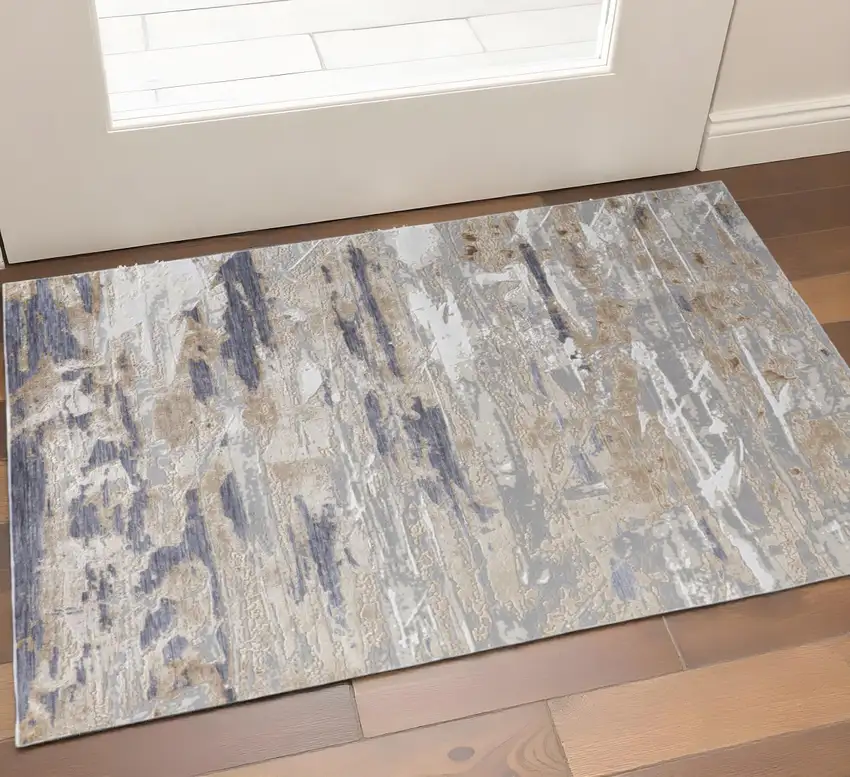 Tan Ivory And Blue Abstract Distressed Area Rug Photo 1