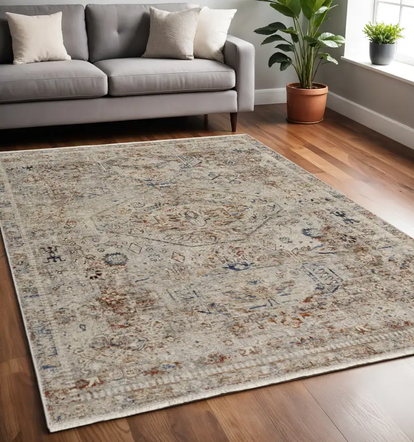 Tan and Red Floral Power Loom Distressed Non Skid Area Rug With Fringe Photo 1