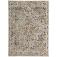 Photo of Tan Orange And Red Floral Power Loom Distressed Area Rug With Fringe