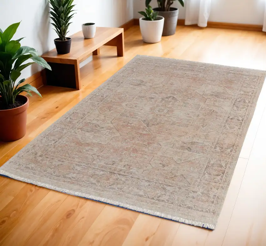 Tan Orange and Ivory Oriental Hand Woven Distressed Area Rug With Fringe Photo 1