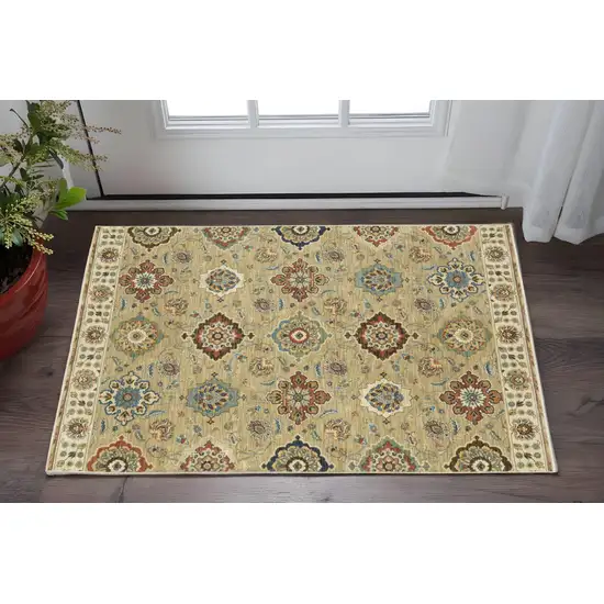 Tan Red And Blue Floral Area Rug With Fringe Photo 1