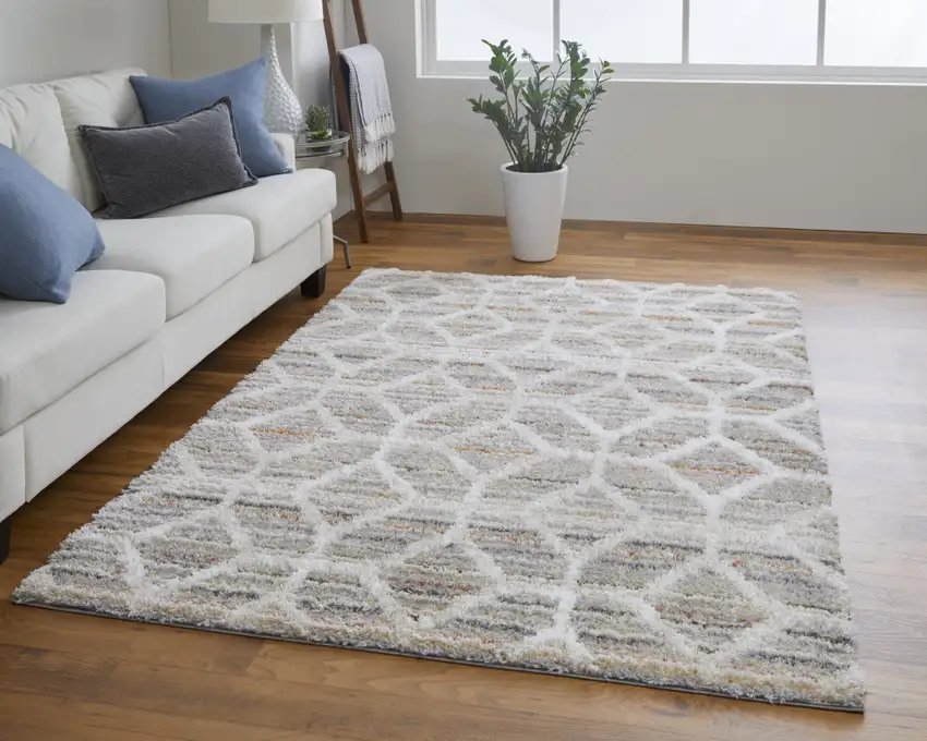 Tan Taupe And Ivory Geometric Power Loom Stain Resistant Area Rug Photo 6
