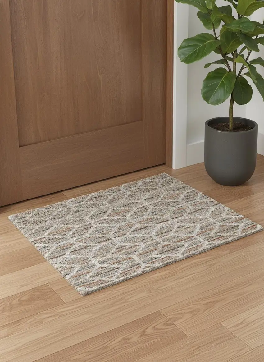 Tan Taupe And Ivory Geometric Power Loom Stain Resistant Area Rug Photo 1