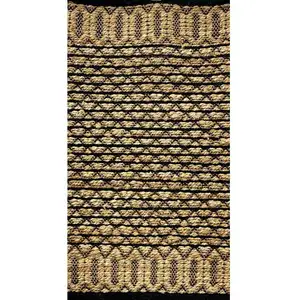 Photo of Tan and Black Ornate Geometric Area Rug