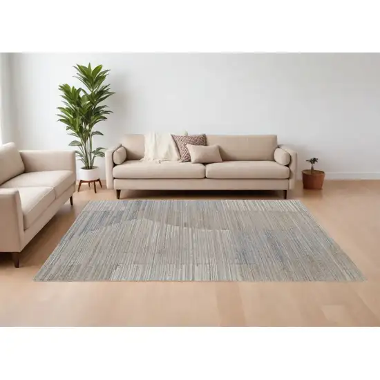 Tan and Blue Abstract Hand Woven Worn Faded Area Rug Photo 1