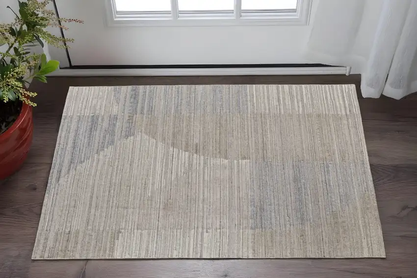 Tan and Blue Abstract Hand Woven Worn Faded Area Rug Photo 1