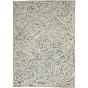 Photo of Tan and Blue Wool Geometric Area Rug
