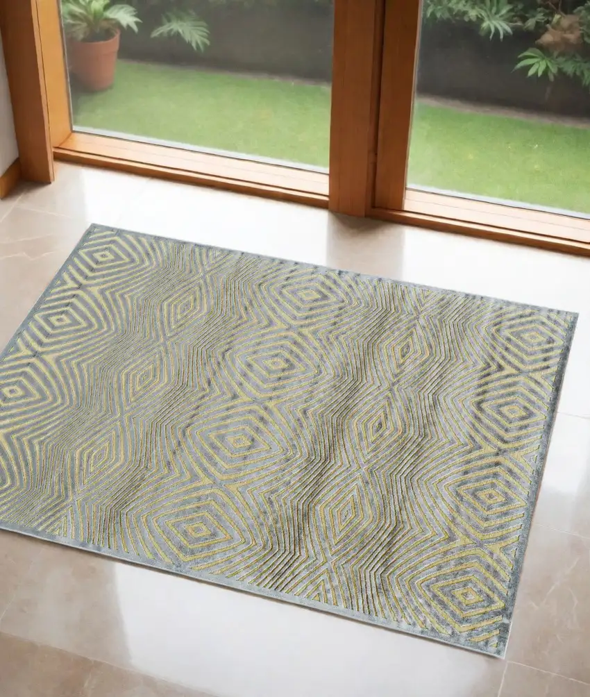 Tan and Gray Abstract Power Loom Area Rug Photo 1