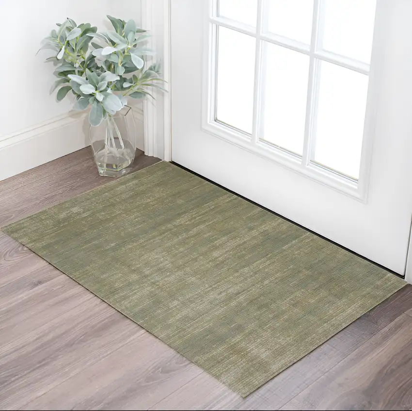 Tan and Green Power Loom Area Rug Photo 1