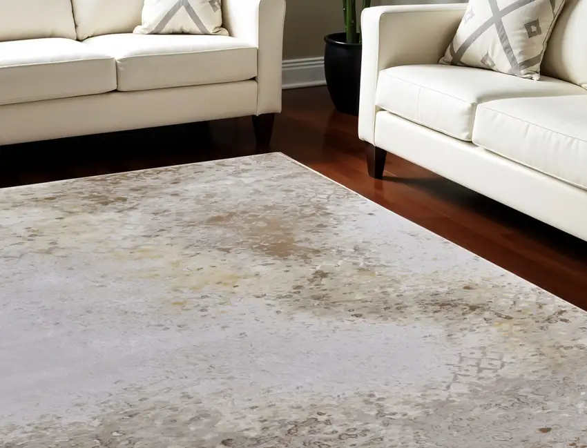Tan and Ivory Abstract Power Loom Worn Faded Area Rug Photo 1