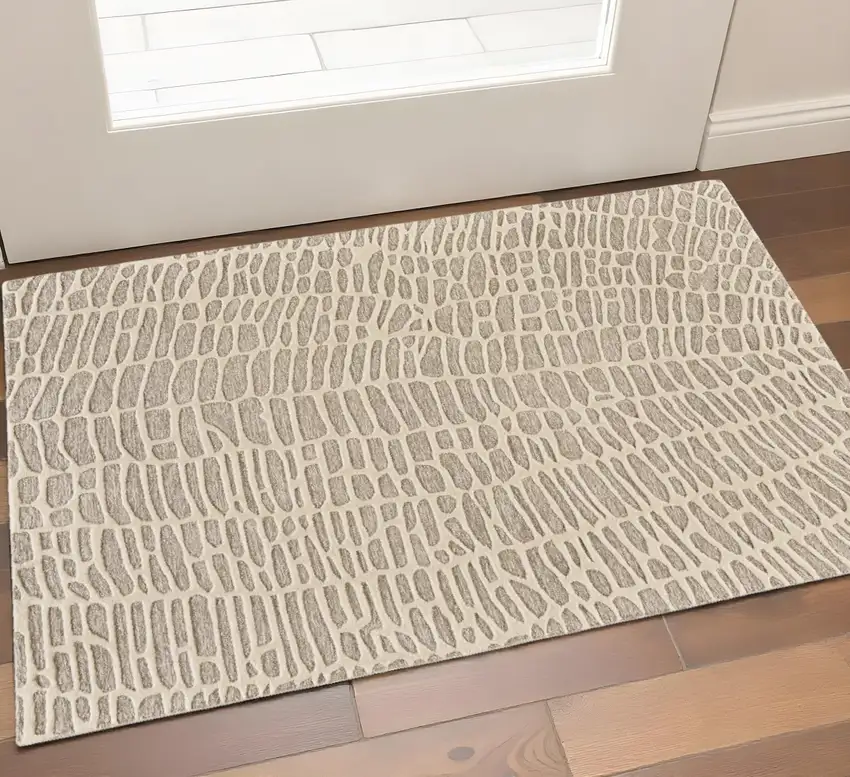 Tan and Ivory Wool Abstract Hand Tufted Area Rug Photo 1