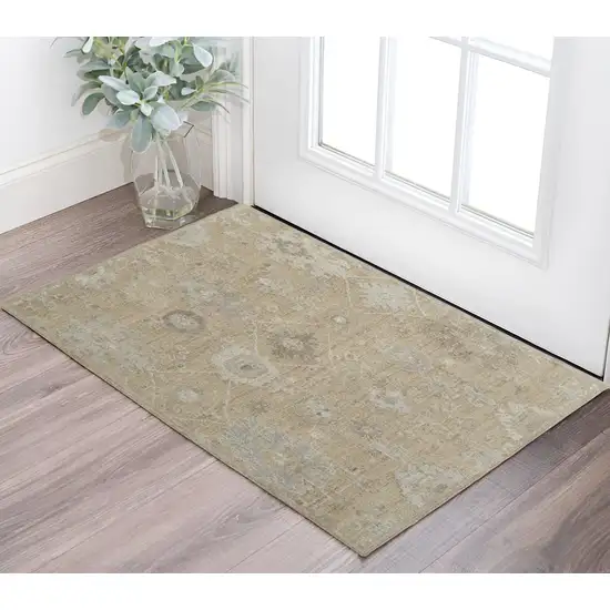 Tan and Ivory Wool Floral Hand Knotted Area Rug Photo 1