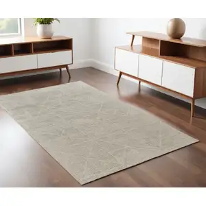 Photo of Tan and Ivory Wool Hand Knotted Area Rug