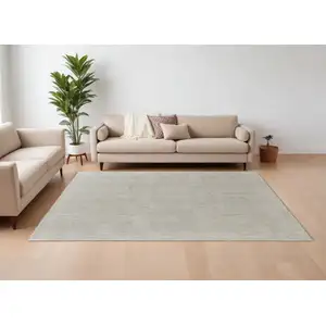 Photo of Tan and Ivory Wool Hand Knotted Area Rug
