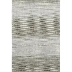 Photo of Taupe And Beige Abstract Washable Area Rug With UV Protection